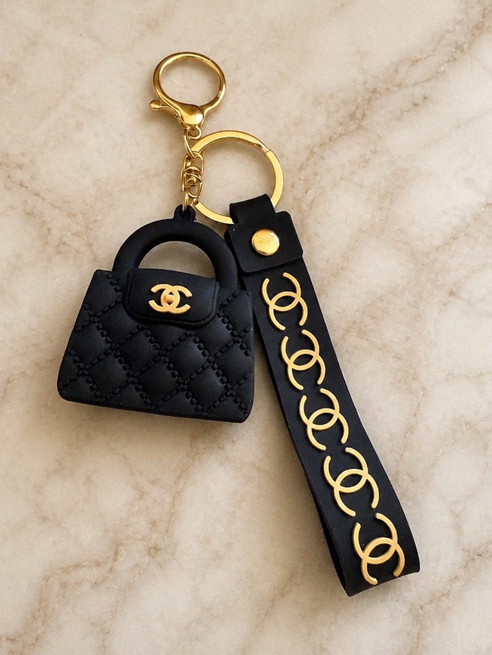 CHANEL Black Quilted Mini Purse Key Holder with Gold CC Accents